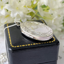 Load image into Gallery viewer, Vintage Sterling Silver Engraved Oval Locket Pendant Necklace. Flower Garland Locket &amp; Chain. Medium Size 2-Photo Locket Necklace, Germany
