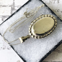 Load image into Gallery viewer, Vintage Edwardian Style Sterling Silver Oval Locket &amp; Curb Chain. Repousse Engraved English Silver Photo/Keepsake Locket Pendant Necklace
