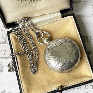 Antique English Silver Sovereign Case Locket Pendant Necklace. Edwardian Forget-Me-Not Engraved Round Puffy Keepsake Locket Pendant On Chain