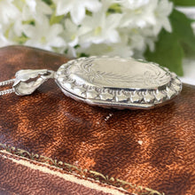 Load image into Gallery viewer, Vintage Edwardian Style Sterling Silver Oval Locket &amp; Curb Chain. Repousse Engraved English Silver Photo/Keepsake Locket Pendant Necklace
