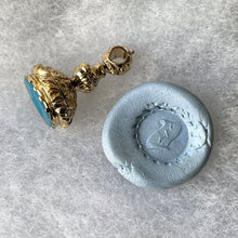 Load image into Gallery viewer, Georgian 9ct Gold Turquoise Intaglio Seal Fob Pendant. &quot;UXL Scroll&quot; Antique Blue Paste Tassie Seal. Georgian Floral Carved Gold Pendant Fob
